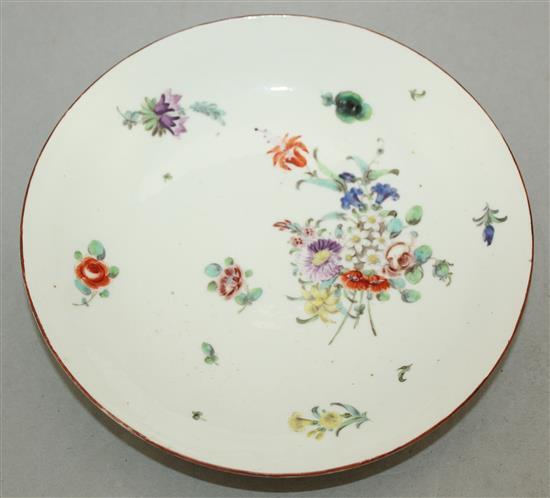 A Champions Bristol porcelain coffee cup and saucer and a similar saucer dish, c.1775, 18.5cm.